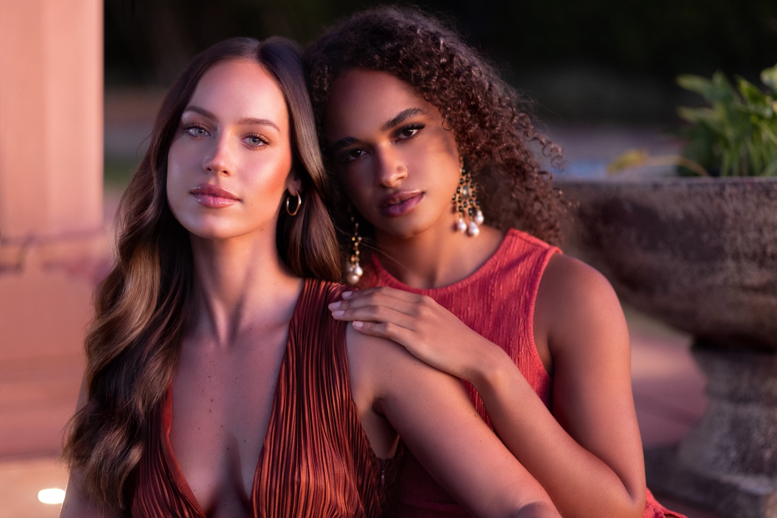 Two models with radiant lash and brow artistry